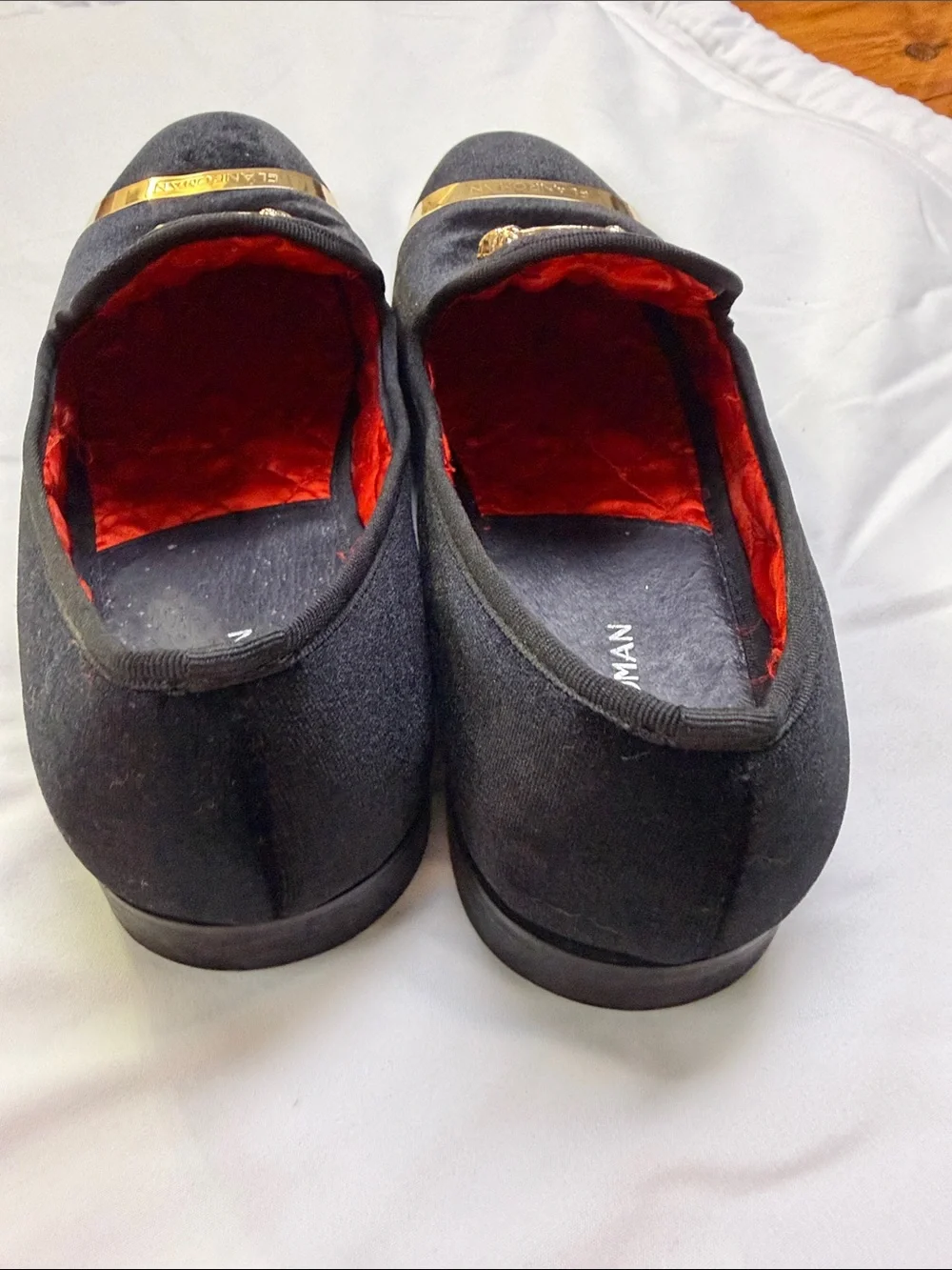 Black Velvet Slip-On Loafers with Gold Crest and Toe Bar by